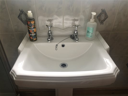 The Tamar room en suite shower has Faith in Nature toiletries at Forda farm B&B on the North Devon / North Cornwall border.